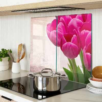 Tabla para cortar Flores de tulipán sobre un fondo rosa