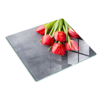 Tabla para cortar Tulipanes sobre un fondo gris