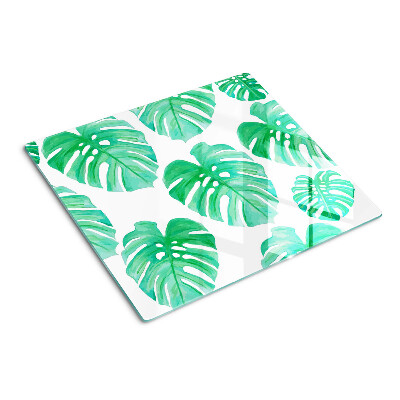 Tabla para cortar Hojas de monstera sobre fondo blanco