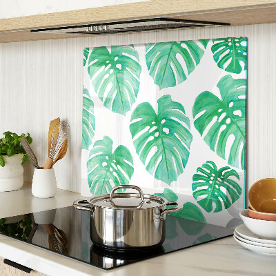Tabla para cortar Hojas de monstera sobre fondo blanco