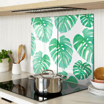 Tabla para cortar Hojas de monstera sobre fondo blanco