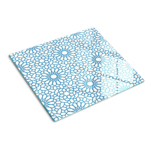 Tabla de cortar de cristal Motivo floral en tonos azules.