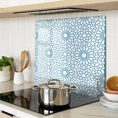 Tabla de cortar de cristal Motivo floral en tonos azules.