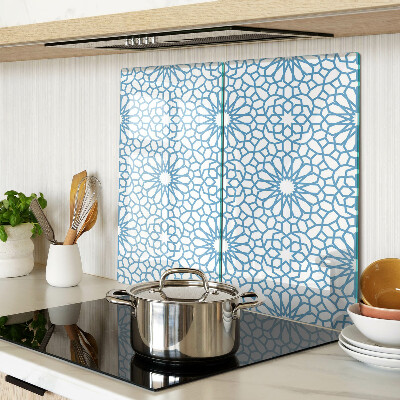 Tabla de cortar de cristal Motivo floral en tonos azules.