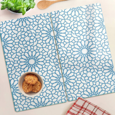 Tabla de cortar de cristal Motivo floral en tonos azules.
