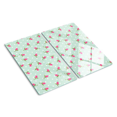Tabla para cortar Tulipanes rosados sobre un fondo verde