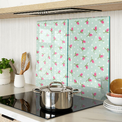 Tabla para cortar Tulipanes rosados sobre un fondo verde