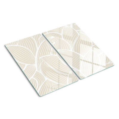 Tabla de cortar de cristal Hojas en un patrón delicado.