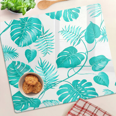 Tabla de cortar de cristal Hojas tropicales en tonos verdes.
