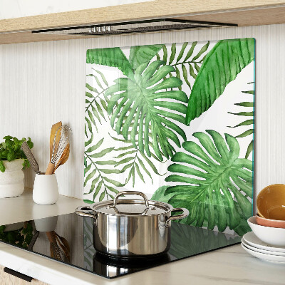 Tabla para cortar Hojas tropicales en tonos verdes.