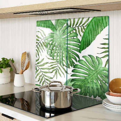 Tabla para cortar Hojas tropicales en tonos verdes.