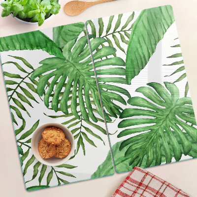 Tabla para cortar Hojas tropicales en tonos verdes.