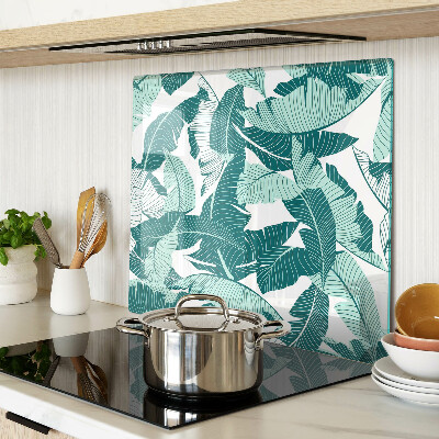 Tabla para cortar Hojas tropicales en tonos verdes.