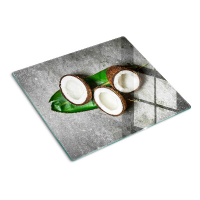 Tabla para cortar Coco sobre fondo de hormigón