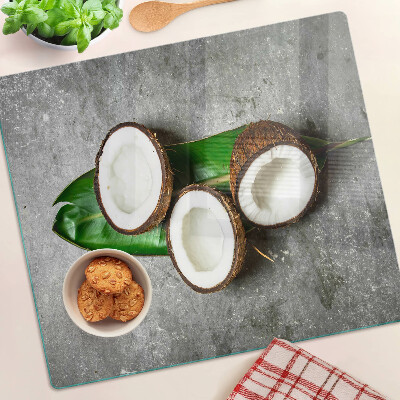 Tabla para cortar Coco sobre fondo de hormigón