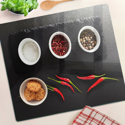 Tabla de cortar de cristal Especias y pimientos rojos