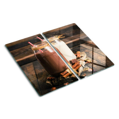 Tabla para cortar Frascos con bebidas sobre un fondo de madera