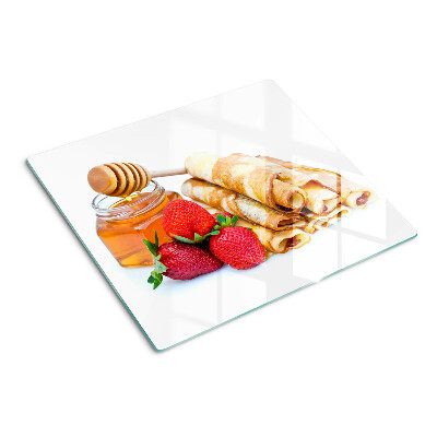 Tabla para cortar Panqueques con miel y fresas