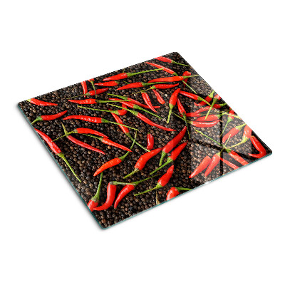 Tabla de cortar de cristal Chiles sobre pimienta negra