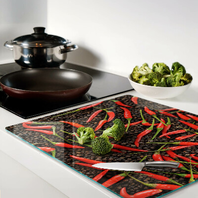 Tabla de cortar de cristal Chiles sobre pimienta negra