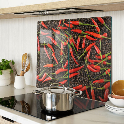 Tabla de cortar de cristal Chiles sobre pimienta negra