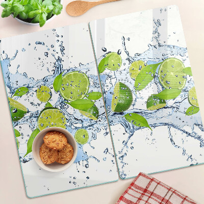 Tabla de cortar de cristal Limones en agua
