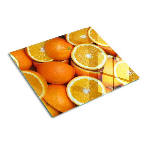 Tabla de cortar de cristal naranjas en rodajas