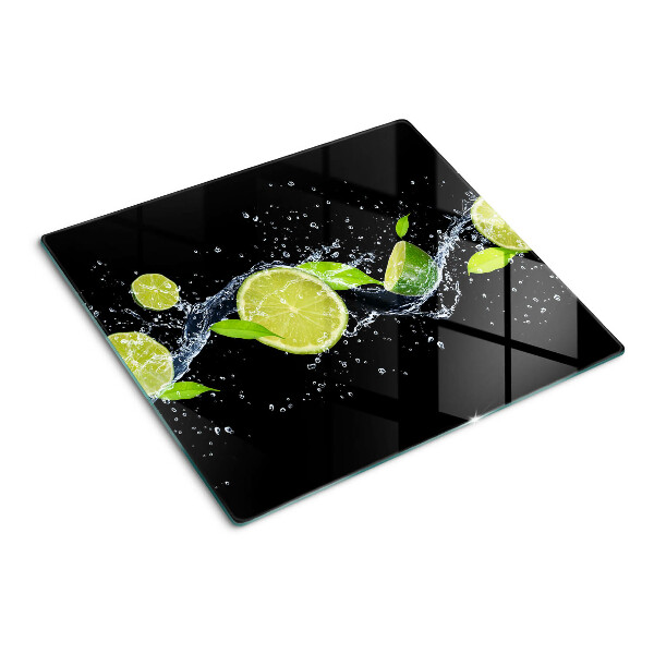 Tabla de cortar de cristal Limones en agua con hojas de menta
