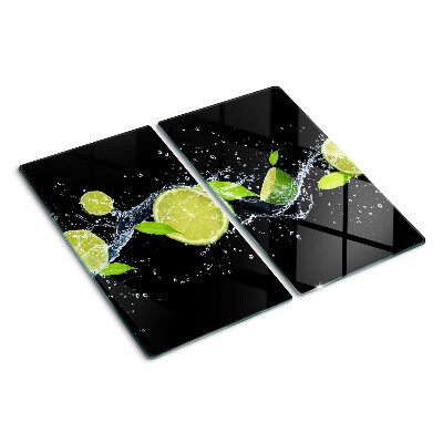 Tabla de cortar de cristal Limones en agua con hojas de menta