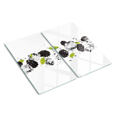 Tabla para cortar Frambuesas con hojas y gotas de agua.