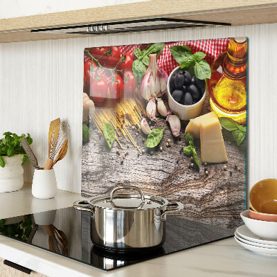 Tabla de cortar de cristal Cocina italiana con pasta y verduras.