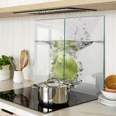 Tabla de cortar de cristal Manzana verde en agua