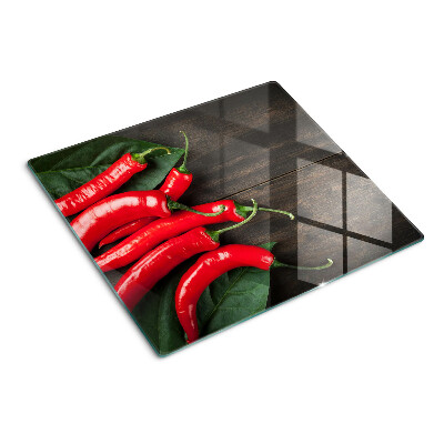 Tabla para cortar Chiles sobre un fondo de madera