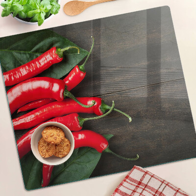 Tabla para cortar Chiles sobre un fondo de madera