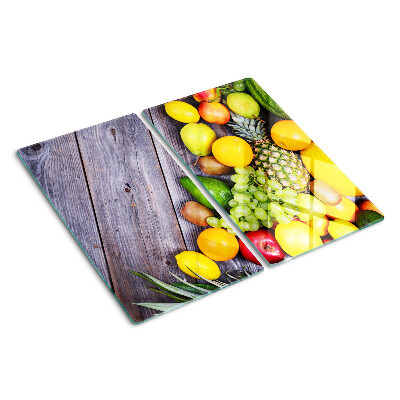 Tabla de cortar de cristal Frutas sobre un fondo de madera