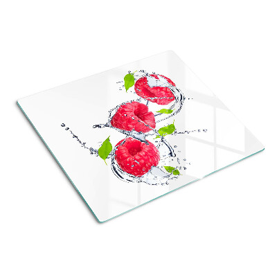 Tabla de cortar de cristal Frambuesas en agua con hojas
