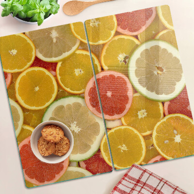 Tabla de cortar de cristal Frutas cítricas en colores del arco iris
