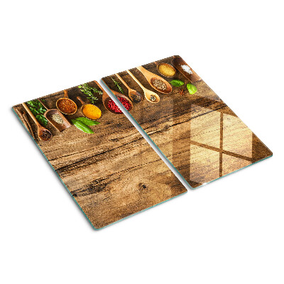 Tabla para cortar Especias y hierbas sobre un fondo de madera.