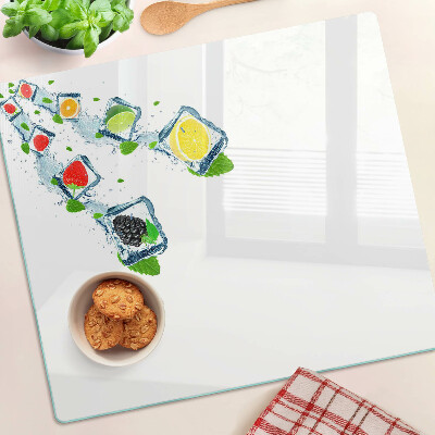 Tabla de cortar de cristal Motivo de fruta con rodajas de colores.