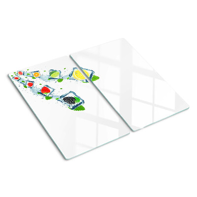 Tabla de cortar de cristal Motivo de fruta con rodajas de colores.
