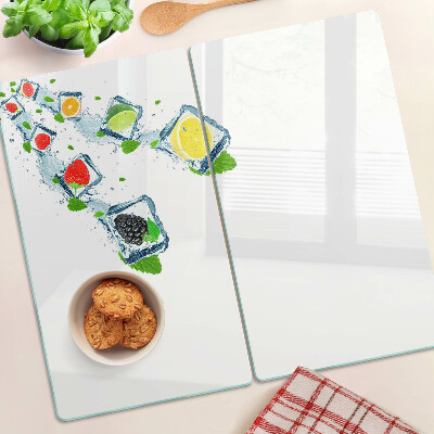 Tabla de cortar de cristal Motivo de fruta con rodajas de colores.