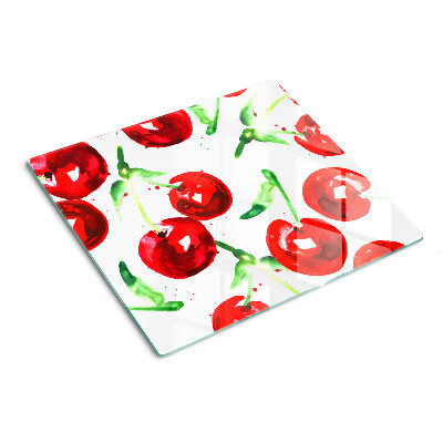 Tabla de cortar de cristal Cerezas rojas sobre un fondo blanco