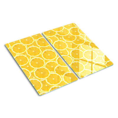Tabla para cortar Rodajas de limón sobre un fondo amarillo