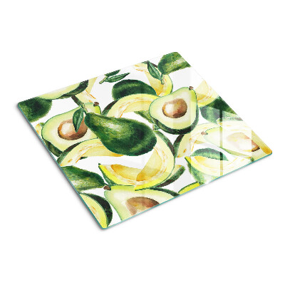 Tabla para cortar Aguacate sobre un fondo de hojas