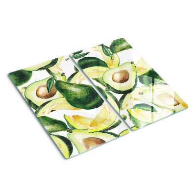Tabla para cortar Aguacate sobre un fondo de hojas