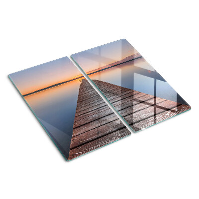 Tabla de cortar de cristal Muelle en el lago al atardecer