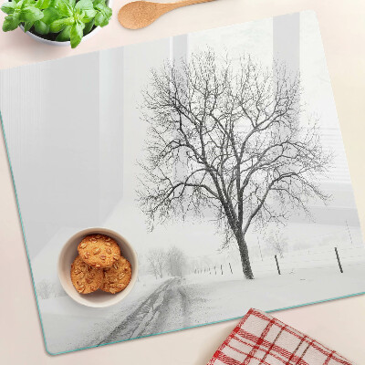 Tabla para cortar Paisaje invernal vacío con un árbol