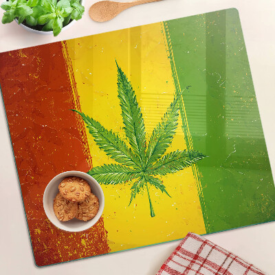 Tabla para cortar Hoja de cáñamo sobre un fondo de color