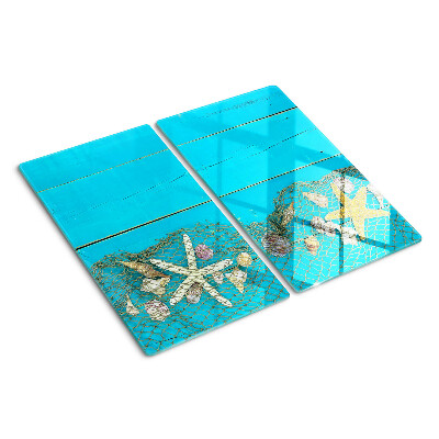 Tabla de cortar de cristal Conchas y estrellas de mar en una red