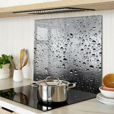 Tabla de cortar de cristal Gotas de agua sobre el vidrio